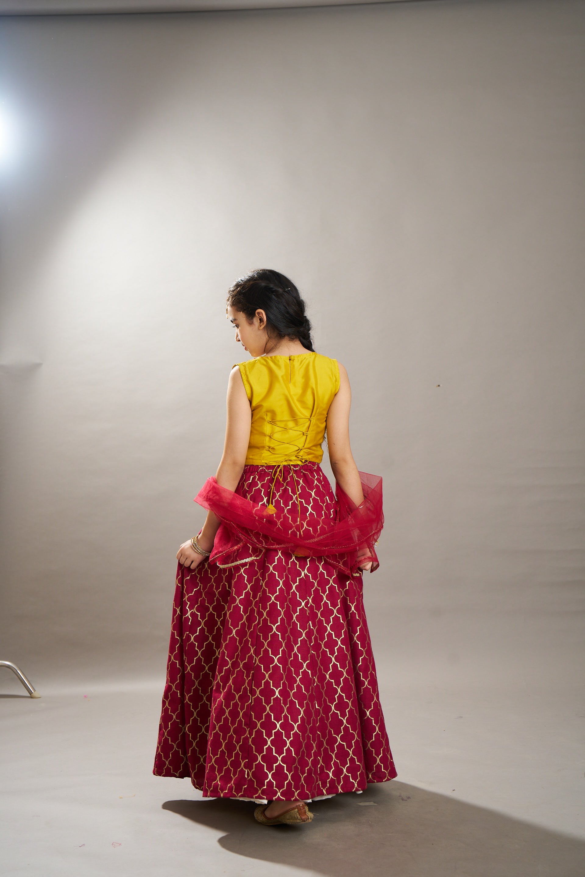 girls maroon yellow foil print with embroidered yoke choli lehenga with dupatta