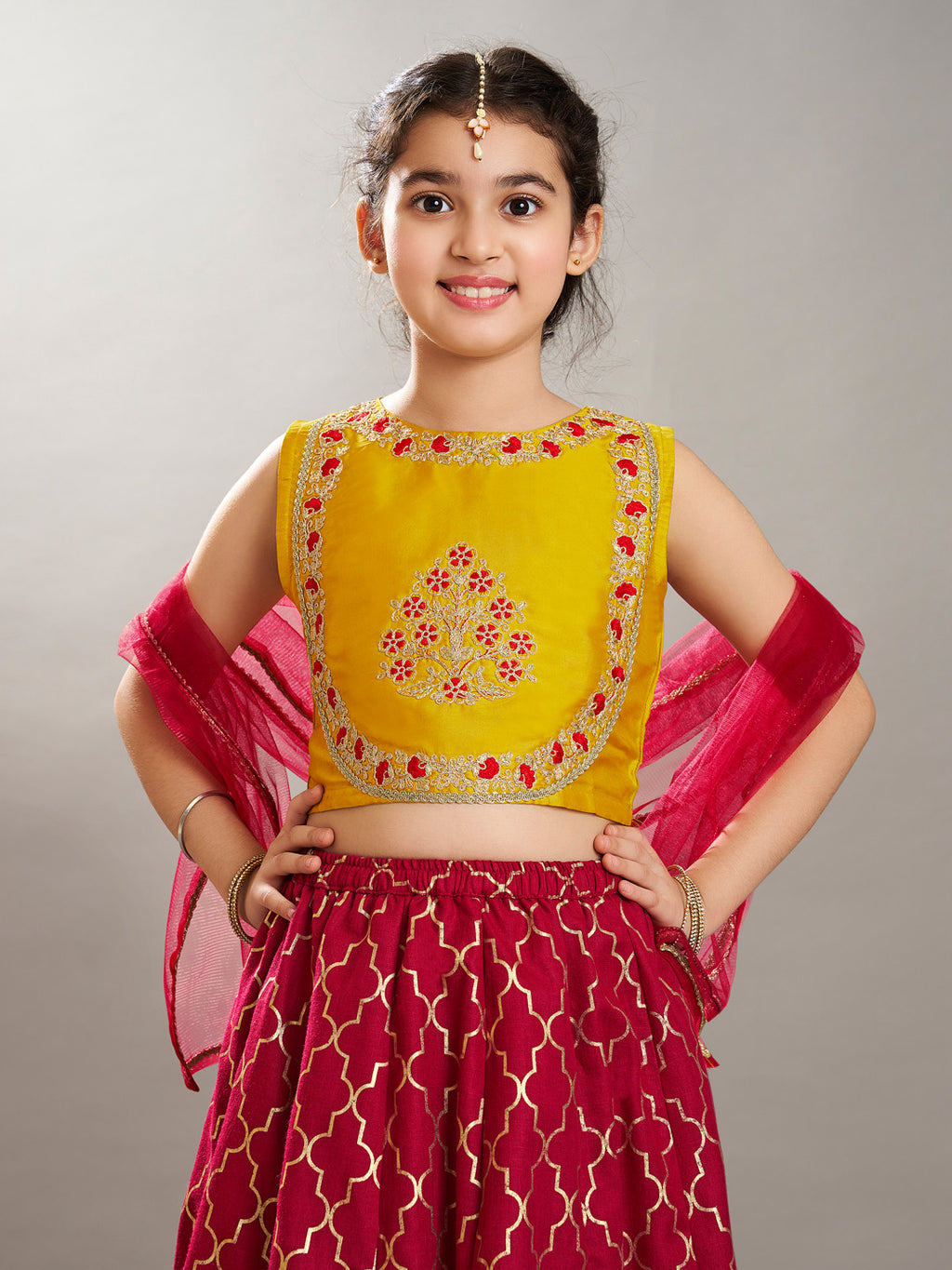 girls maroon yellow foil print with embroidered yoke choli lehenga with dupatta