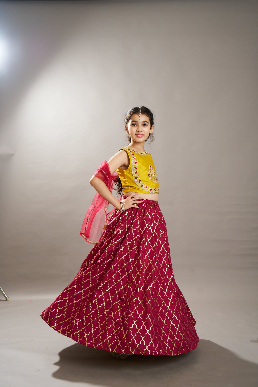 girls maroon yellow foil print with embroidered yoke choli lehenga with dupatta