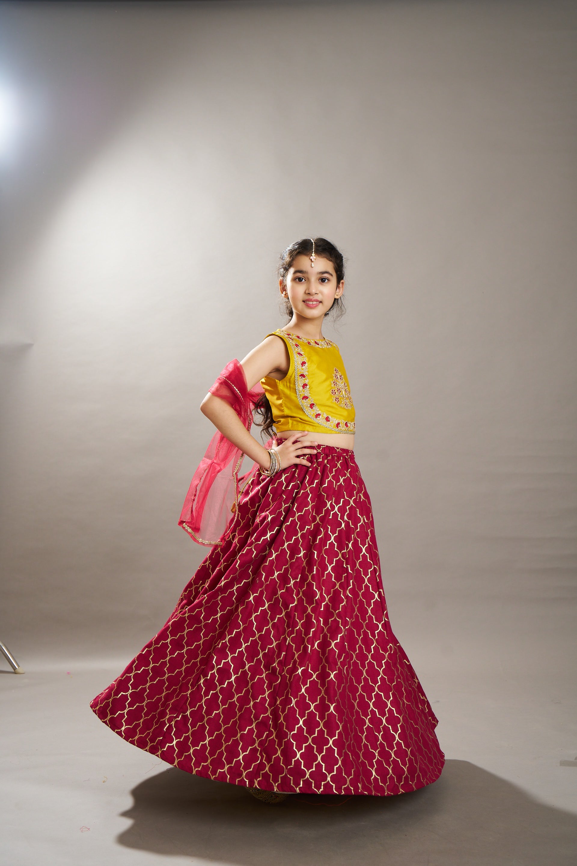 girls maroon yellow foil print with embroidered yoke choli lehenga with dupatta