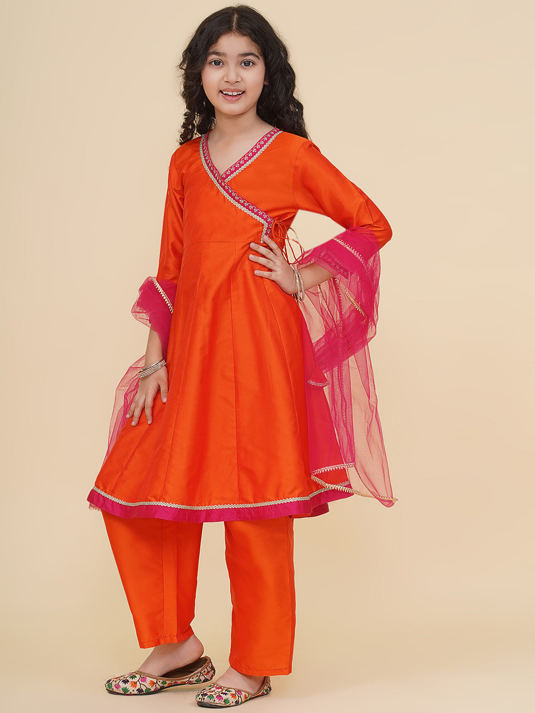 girls orange angrakha kurta with trousers with dupatta