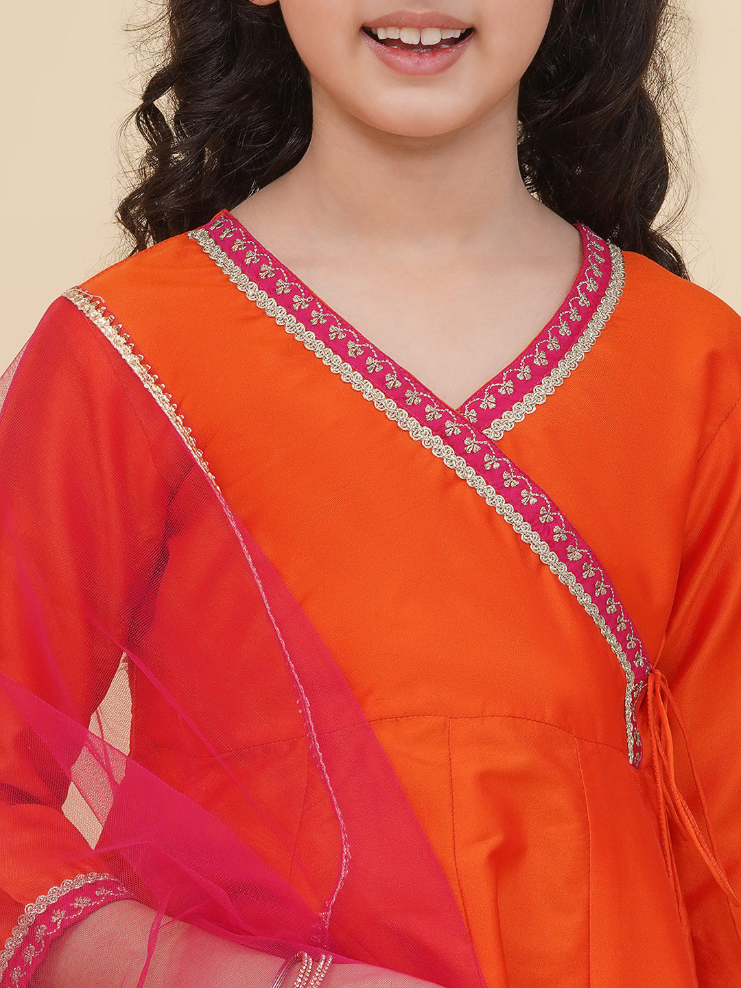 girls orange angrakha kurta with trousers with dupatta