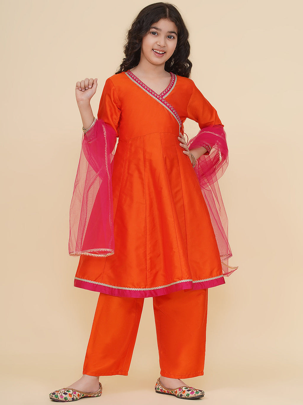 girls orange angrakha kurta with trousers with dupatta