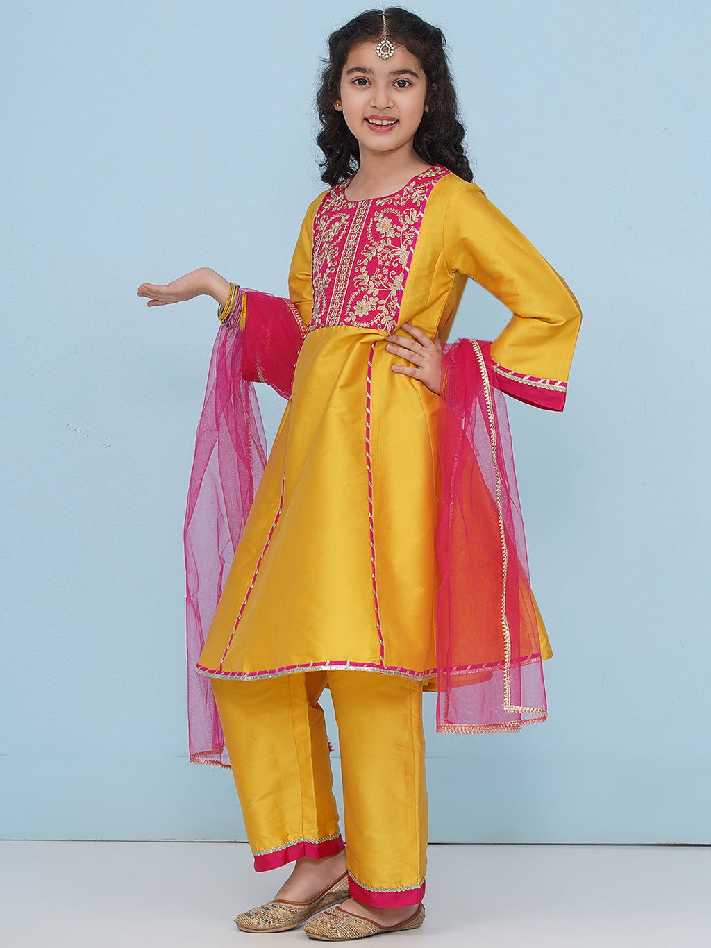 girls yellow a line kurta with trousers dupatta