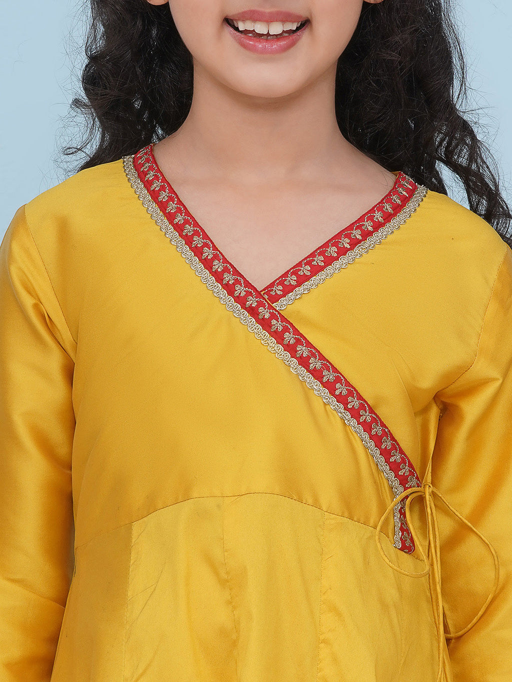 girls yellow angrakha kurta with trousers