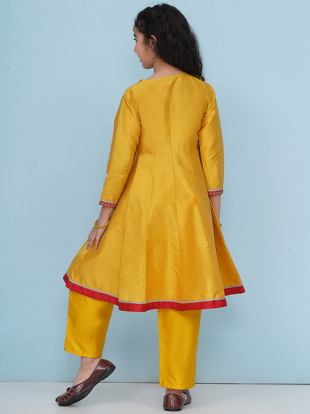 girls yellow angrakha kurta with trousers