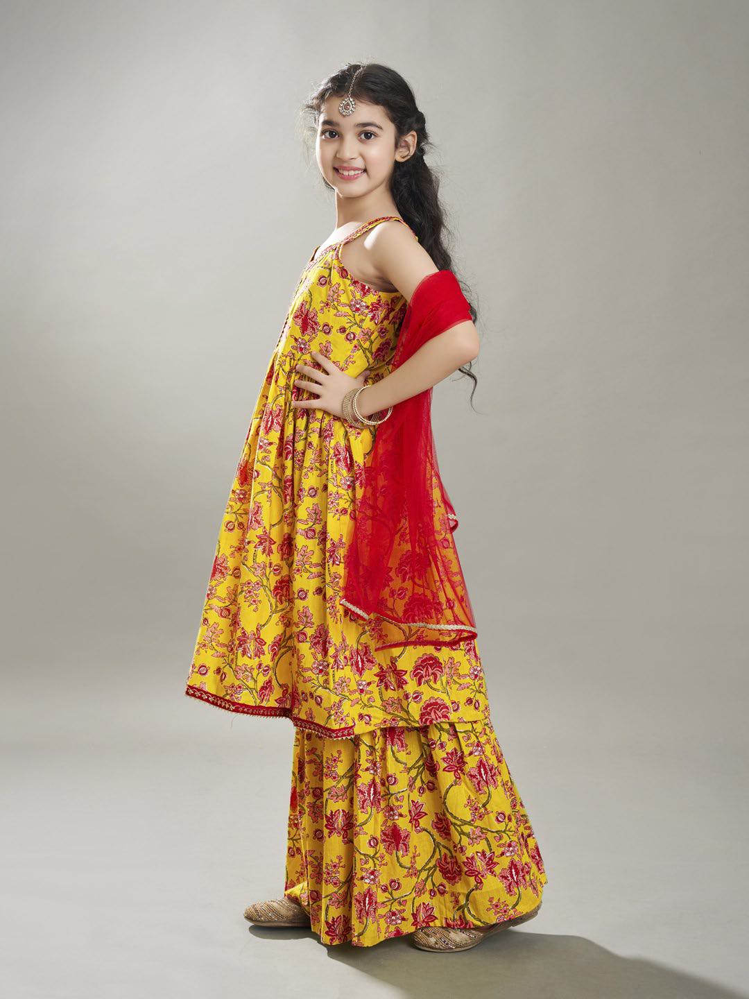 girls yellow cotton kurta with sharara set with dupatta