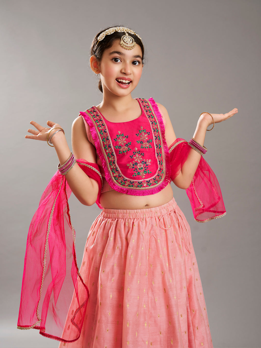 girlspink peach woven design with embroidered yoke choli lehenga with dupatta